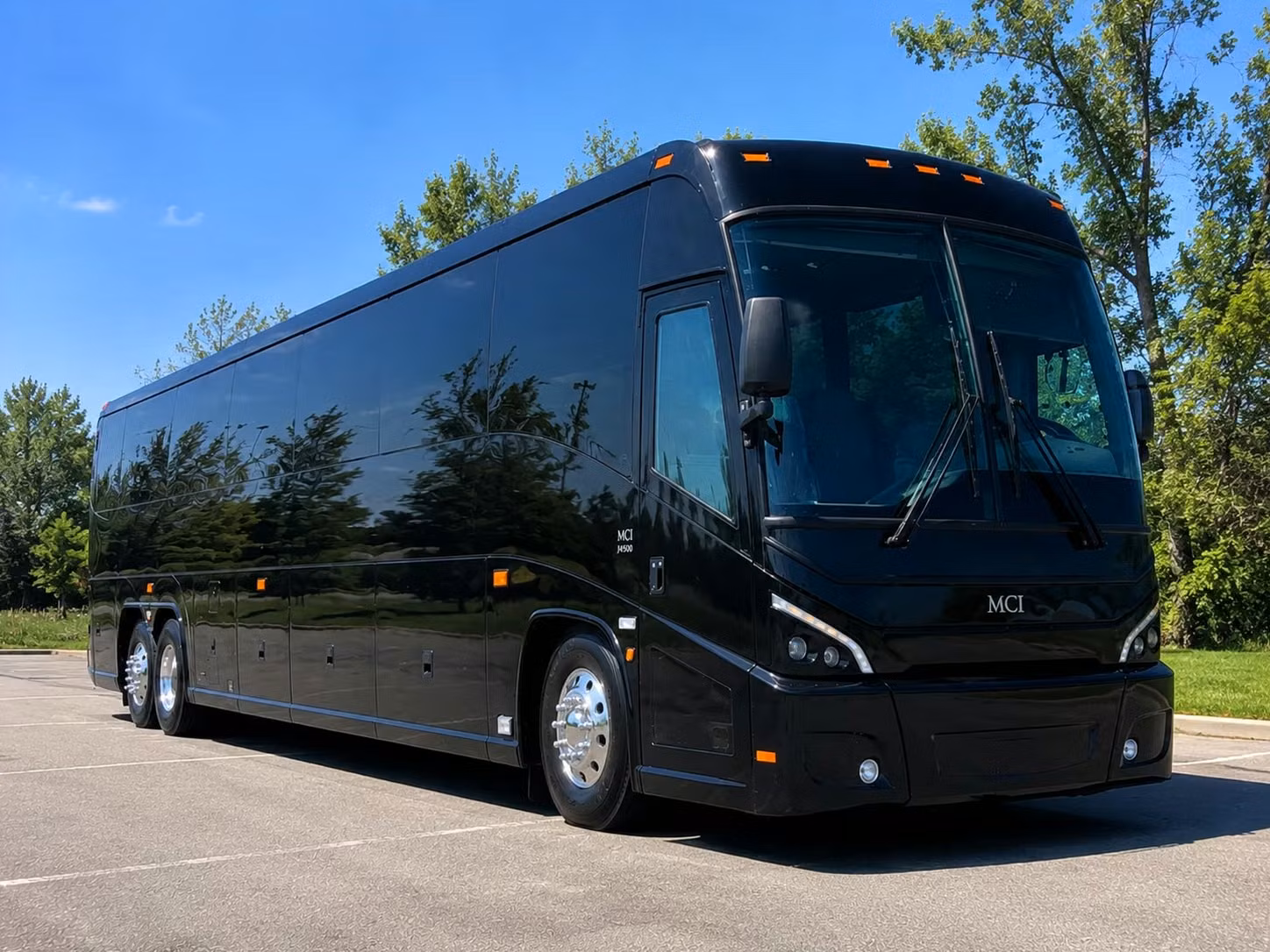 full size charter buses for long distance iowa city academic trips